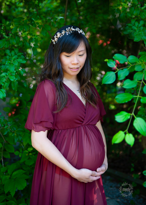 Markham outdoor maternity photoshoot green leafy forest. 30 week expectant mother in red dress gold hour sunlight