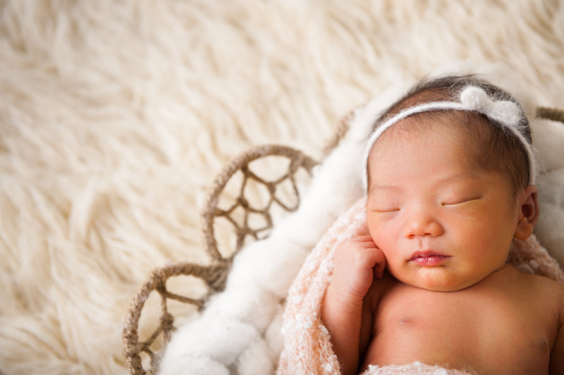 Markham Ontario professional newborn photographer in studio posing clear skin retouched