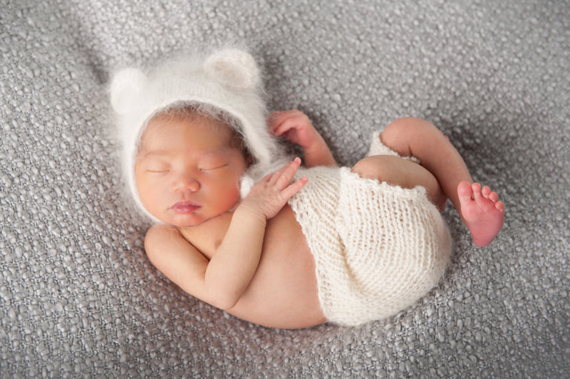 Stouffville Ontario Hark Nijjar Photography Studio newborn professional  photoshoot with white bonnet
