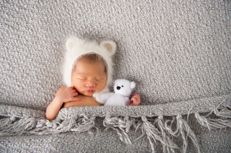 Stouffville Ontario Hark Nijjar Photography Studio newborn professional  photoshoot with towel and teddy bear cute bonnet
